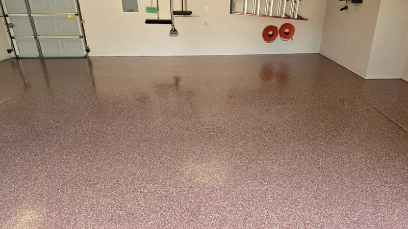 Custom red and tan flake epoxy floor installed by NES Flooring