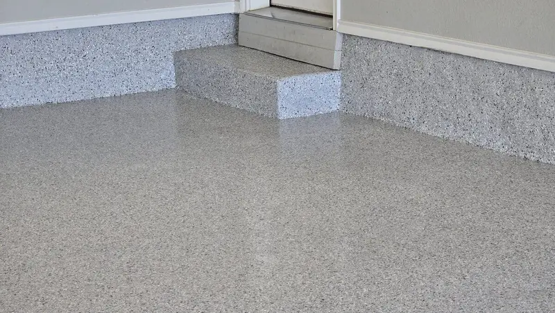 Flake epoxy coating carried up the concrete steps into a home
